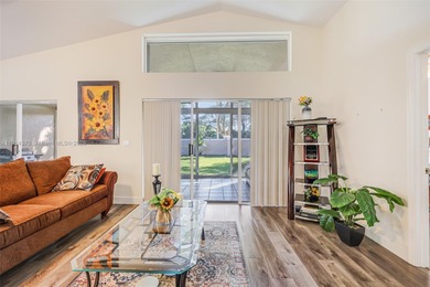 Welcome to this bright and inviting 3BR/2BA residence in the on Westchester Golf and Country Club in Florida - for sale on GolfHomes.com, golf home, golf lot