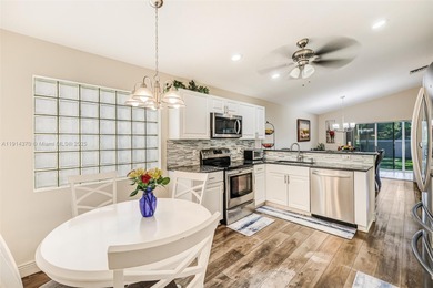 Welcome to this bright and inviting 3BR/2BA residence in the on Westchester Golf and Country Club in Florida - for sale on GolfHomes.com, golf home, golf lot