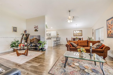 Welcome to this bright and inviting 3BR/2BA residence in the on Westchester Golf and Country Club in Florida - for sale on GolfHomes.com, golf home, golf lot