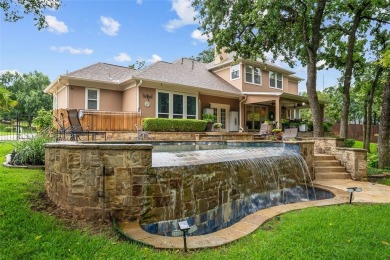Situated on a quiet cul-de-sac in the sought-after golf on Trophy Club of Dallas in Texas - for sale on GolfHomes.com, golf home, golf lot