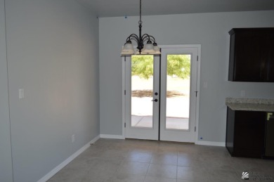 MOVE IN READY. NEW SPEC HOME IN COYOTE WASH GOLF COURSE on The Links At Coyote Wash in Arizona - for sale on GolfHomes.com, golf home, golf lot