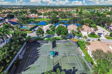 Welcome to this bright and inviting 3BR/2BA residence in the on Westchester Golf and Country Club in Florida - for sale on GolfHomes.com, golf home, golf lot