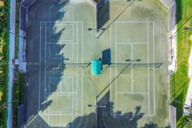 Welcome to this bright and inviting 3BR/2BA residence in the on Westchester Golf and Country Club in Florida - for sale on GolfHomes.com, golf home, golf lot