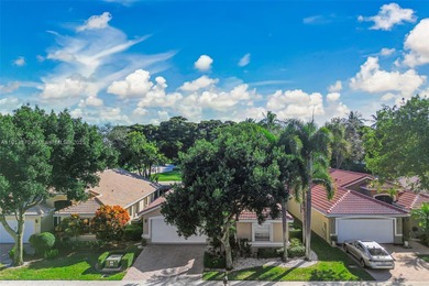 Welcome to this bright and inviting 3BR/2BA residence in the on Westchester Golf and Country Club in Florida - for sale on GolfHomes.com, golf home, golf lot