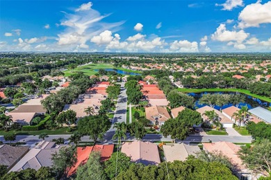Welcome to this bright and inviting 3BR/2BA residence in the on Westchester Golf and Country Club in Florida - for sale on GolfHomes.com, golf home, golf lot