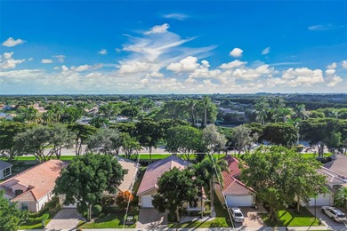 Welcome to this bright and inviting 3BR/2BA residence in the on Westchester Golf and Country Club in Florida - for sale on GolfHomes.com, golf home, golf lot