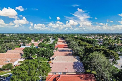 Welcome to this bright and inviting 3BR/2BA residence in the on Westchester Golf and Country Club in Florida - for sale on GolfHomes.com, golf home, golf lot
