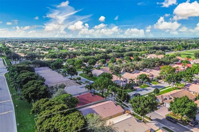 Welcome to this bright and inviting 3BR/2BA residence in the on Westchester Golf and Country Club in Florida - for sale on GolfHomes.com, golf home, golf lot