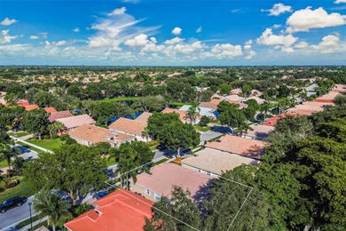 Welcome to this bright and inviting 3BR/2BA residence in the on Westchester Golf and Country Club in Florida - for sale on GolfHomes.com, golf home, golf lot