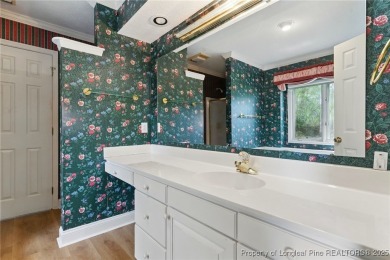 Seller offering $8,000 toward buyer's closing costs with an on Baywood Golf Club in North Carolina - for sale on GolfHomes.com, golf home, golf lot