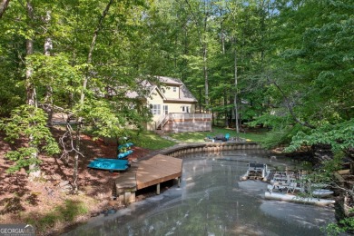 PRICE IMPROVEMENT - WATERFRONT RETREAT - PERFECT FOR THE KAYAK on The Highlands Course at Lake Arrowhead in Georgia - for sale on GolfHomes.com, golf home, golf lot