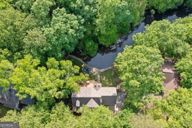 PRICE IMPROVEMENT - WATERFRONT RETREAT - PERFECT FOR THE KAYAK on The Highlands Course at Lake Arrowhead in Georgia - for sale on GolfHomes.com, golf home, golf lot