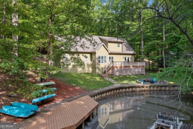 PRICE IMPROVEMENT - WATERFRONT RETREAT - PERFECT FOR THE KAYAK on The Highlands Course at Lake Arrowhead in Georgia - for sale on GolfHomes.com, golf home, golf lot