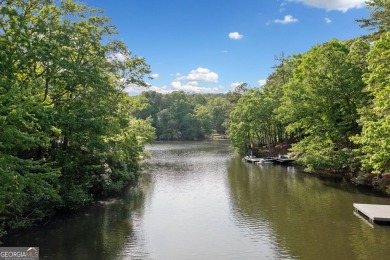 PRICE IMPROVEMENT - WATERFRONT RETREAT - PERFECT FOR THE KAYAK on The Highlands Course at Lake Arrowhead in Georgia - for sale on GolfHomes.com, golf home, golf lot