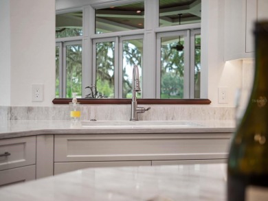 One or more photo(s) has been virtually staged. Nestled along on Lake Nona Golf Club, Inc. in Florida - for sale on GolfHomes.com, golf home, golf lot