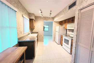 Welcome to your slice of paradise in Bardmoor Country Club! This on Bardmoor Golf and Tennis Club in Florida - for sale on GolfHomes.com, golf home, golf lot