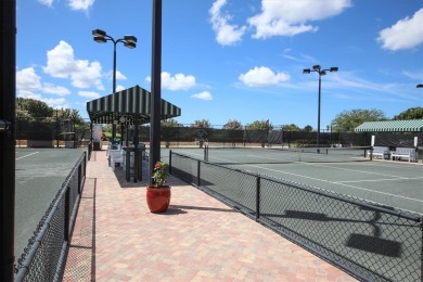 Bright and beautiful, PET friendly first floor end unit condo on Stoneybrook Golf and Country Club of Sarasota in Florida - for sale on GolfHomes.com, golf home, golf lot