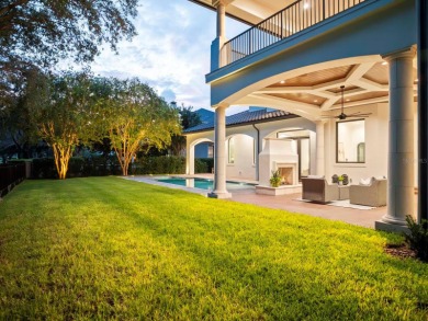 One or more photo(s) has been virtually staged. Nestled along on Lake Nona Golf Club, Inc. in Florida - for sale on GolfHomes.com, golf home, golf lot
