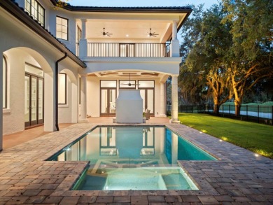 One or more photo(s) has been virtually staged. Nestled along on Lake Nona Golf Club, Inc. in Florida - for sale on GolfHomes.com, golf home, golf lot