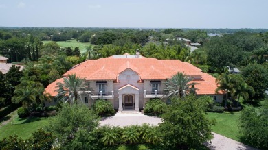 With gorgeous Classical Revival architecture, this estate sits on Isleworth Golf and Country Club in Florida - for sale on GolfHomes.com, golf home, golf lot