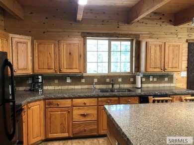 Beautiful cabin located near the Island Park Golf Course! With on Island Park Village Resort Golf Course in Idaho - for sale on GolfHomes.com, golf home, golf lot