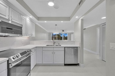 FULLY renovated second-floor 3-bedroom, 2-bath home combining on Palm-Aire Country Club and Resort - The Oaks in Florida - for sale on GolfHomes.com, golf home, golf lot