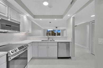 FULLY renovated second-floor 3-bedroom, 2-bath home combining on Palm-Aire Country Club and Resort - The Oaks in Florida - for sale on GolfHomes.com, golf home, golf lot