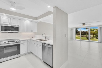 FULLY renovated second-floor 3-bedroom, 2-bath home combining on Palm-Aire Country Club and Resort - The Oaks in Florida - for sale on GolfHomes.com, golf home, golf lot