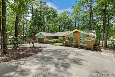 This stunning 4,000-square-foot brick ranch offers a rare blend on Carolina Trace Country Club in North Carolina - for sale on GolfHomes.com, golf home, golf lot
