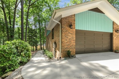 This stunning 4,000-square-foot brick ranch offers a rare blend on Carolina Trace Country Club in North Carolina - for sale on GolfHomes.com, golf home, golf lot