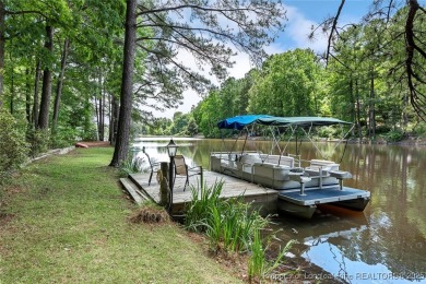 This stunning 4,000-square-foot brick ranch offers a rare blend on Carolina Trace Country Club in North Carolina - for sale on GolfHomes.com, golf home, golf lot