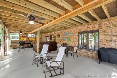 This stunning 4,000-square-foot brick ranch offers a rare blend on Carolina Trace Country Club in North Carolina - for sale on GolfHomes.com, golf home, golf lot