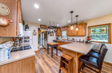 CUTE and COZY ranch home in the Heart of the Lakes. Immaculate on St. Ives Golf Club in Michigan - for sale on GolfHomes.com, golf home, golf lot
