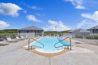 Discover the perfect blend of comfort and convenience in this on Holiday Hills Resort and Golf in Missouri - for sale on GolfHomes.com, golf home, golf lot