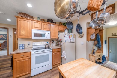 CUTE and COZY ranch home in the Heart of the Lakes. Immaculate on St. Ives Golf Club in Michigan - for sale on GolfHomes.com, golf home, golf lot