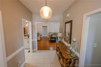 Welcome to this charming ranch home in the highly sought-after on Gates Four Golf and Country Club in North Carolina - for sale on GolfHomes.com, golf home, golf lot