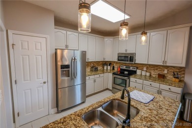 Welcome to this charming ranch home in the highly sought-after on Gates Four Golf and Country Club in North Carolina - for sale on GolfHomes.com, golf home, golf lot