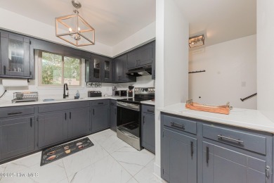 This stunning town home offers true resort-style living--updated on River Bend Golf and Country Club in North Carolina - for sale on GolfHomes.com, golf home, golf lot