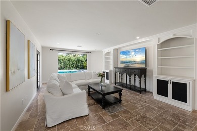 Step into this historic, single-level home in Rancho Mirage on Rancho Las Palmas Country Club in California - for sale on GolfHomes.com, golf home, golf lot