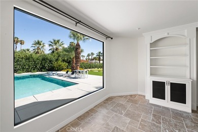 Step into this historic, single-level home in Rancho Mirage on Rancho Las Palmas Country Club in California - for sale on GolfHomes.com, golf home, golf lot