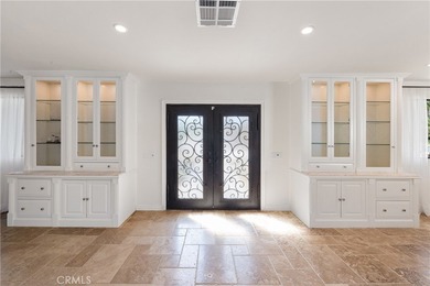 Step into this historic, single-level home in Rancho Mirage on Rancho Las Palmas Country Club in California - for sale on GolfHomes.com, golf home, golf lot