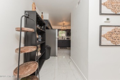 This stunning town home offers true resort-style living--updated on River Bend Golf and Country Club in North Carolina - for sale on GolfHomes.com, golf home, golf lot
