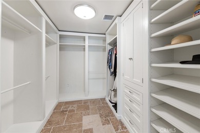 Step into this historic, single-level home in Rancho Mirage on Rancho Las Palmas Country Club in California - for sale on GolfHomes.com, golf home, golf lot