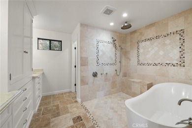 Step into this historic, single-level home in Rancho Mirage on Rancho Las Palmas Country Club in California - for sale on GolfHomes.com, golf home, golf lot