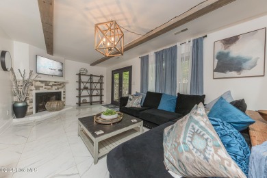 This stunning town home offers true resort-style living--updated on River Bend Golf and Country Club in North Carolina - for sale on GolfHomes.com, golf home, golf lot