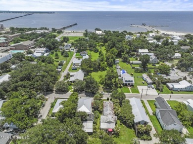 This jewel of a house in Old Town Bay Saint Louis  sits on over on The Bridges Golf Club At Hollywood Casino in Mississippi - for sale on GolfHomes.com, golf home, golf lot