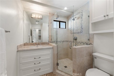 Step into this historic, single-level home in Rancho Mirage on Rancho Las Palmas Country Club in California - for sale on GolfHomes.com, golf home, golf lot