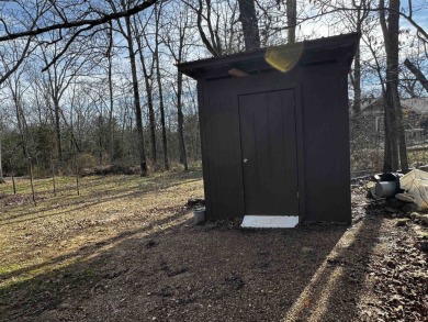 3 bedroom 2 bath home on a level lot.  It's minutes to shopping on The Course At Turkey Mountain in Arkansas - for sale on GolfHomes.com, golf home, golf lot