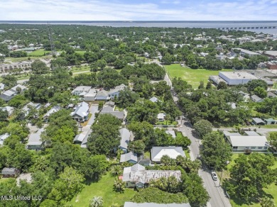 This jewel of a house in Old Town Bay Saint Louis  sits on over on The Bridges Golf Club At Hollywood Casino in Mississippi - for sale on GolfHomes.com, golf home, golf lot