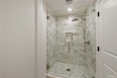 Step into this historic, single-level home in Rancho Mirage on Rancho Las Palmas Country Club in California - for sale on GolfHomes.com, golf home, golf lot